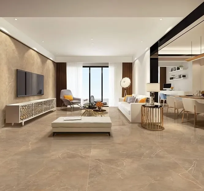 An open-concept luxury apartment living space showing extensive, high-gloss beige marble flooring and a matching polished accent wall behind the entertainment console.