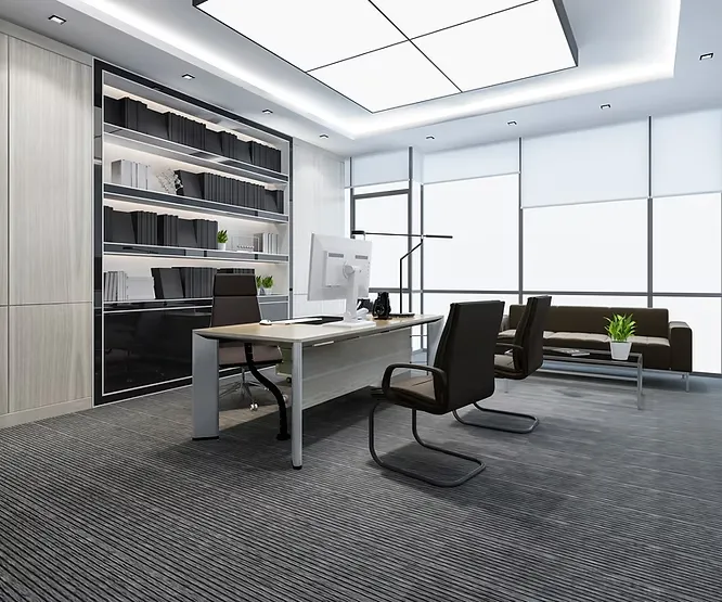 Spacious office with a sleek wooden desk, black chairs, large windows, and a massive geometric ceiling light.