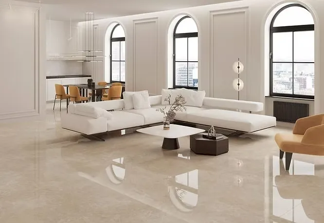 High-end open-plan living area featuring seamless, glossy marble flooring that highlights luxury home interior trends.