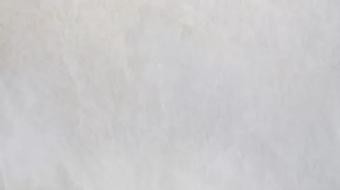 Elegant slab of Turkish Dolomite stone, featuring a highly uniform, smooth, and milky-white premium surface.