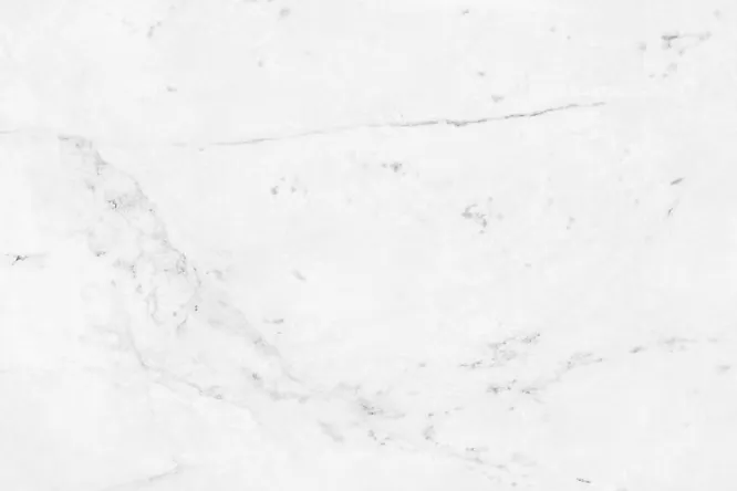 The elegant veining of Michelangelo White Marble, a premium stone whose origin impacts its quality and price.
