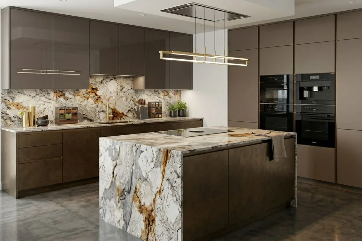 Luxury marble island and dark cabinets create a stylish Kitchen interior with warm lighting.