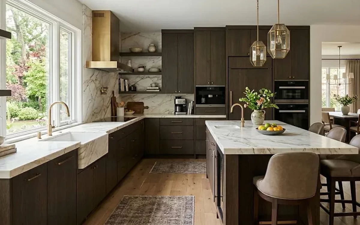 Modern L Shaped Kitchen Interior with dark wood cabinets and a marble island.