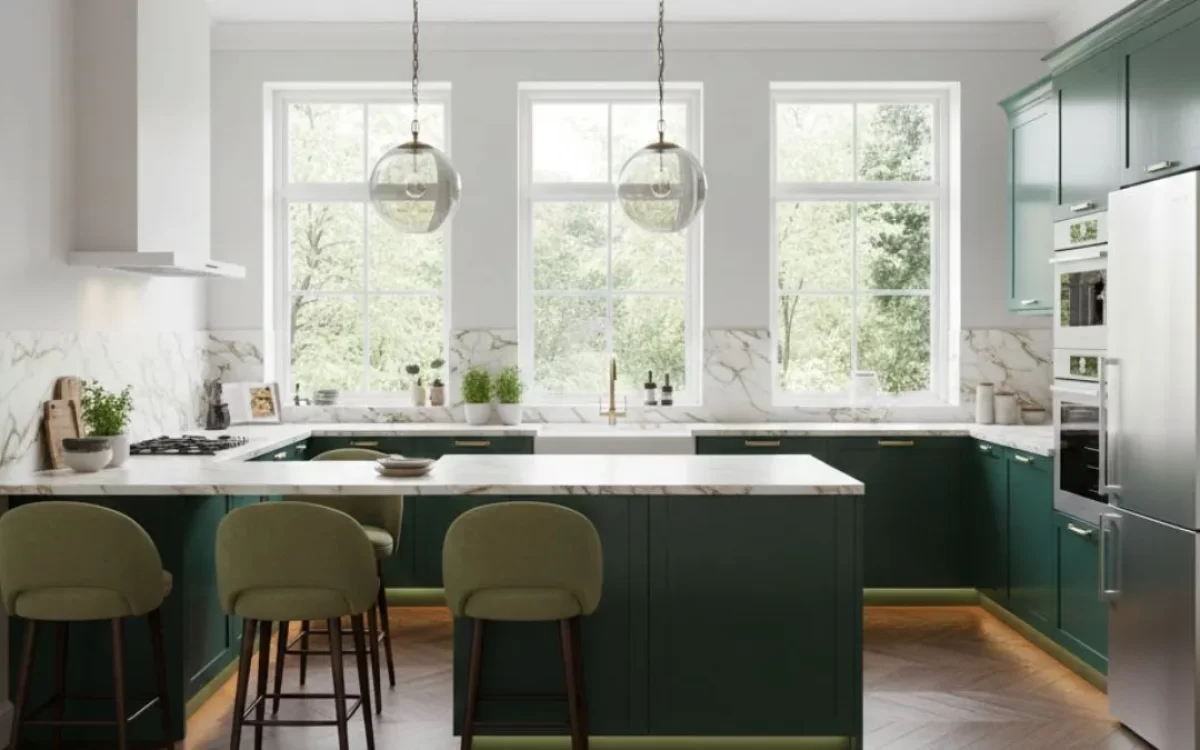 Large green kitchen with marble counters and an island. Comparing different types of kitchen helps you choose a smart, functional design that looks amazing in any modern home.