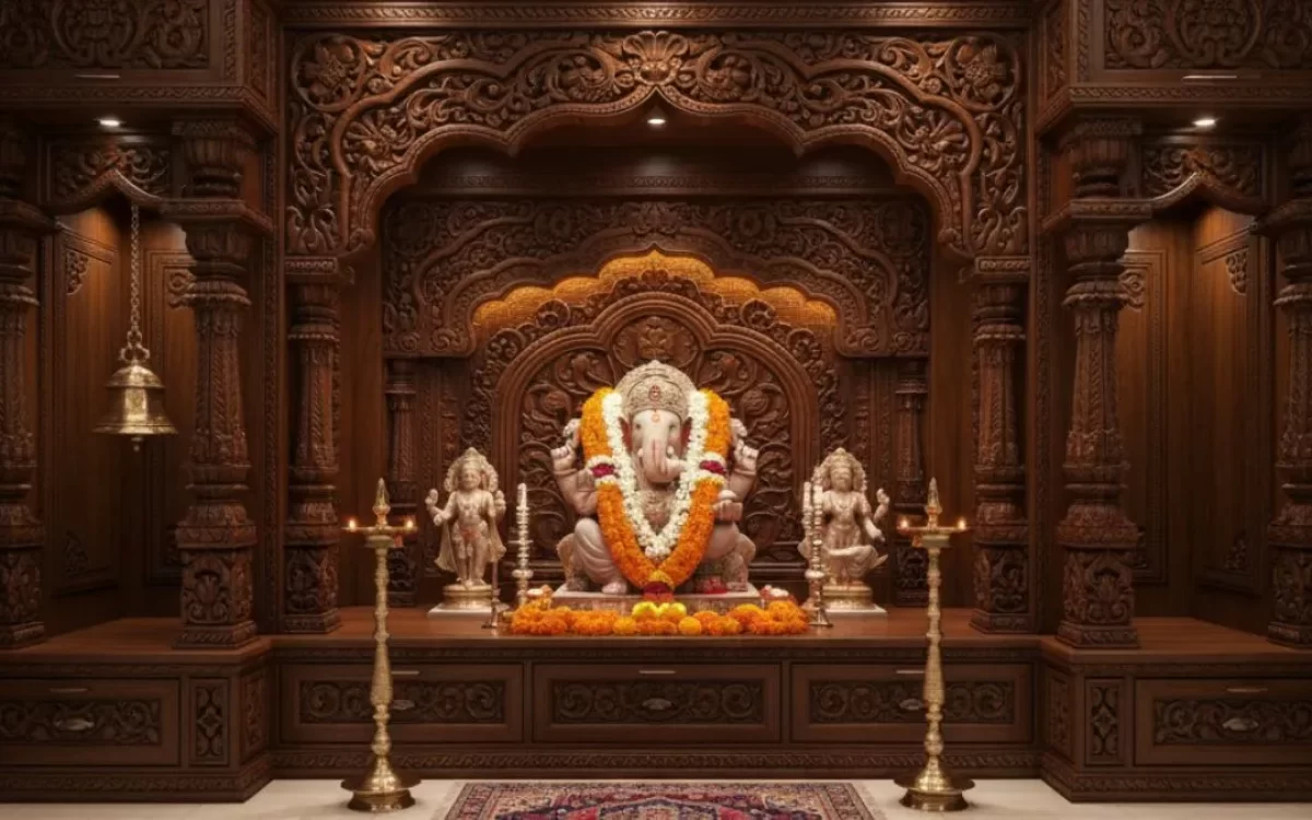 Ornate wooden Pooja room with a central Lord Ganesha idol, intricate carvings, brass diyas, and a hanging bell.