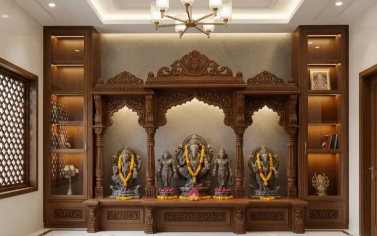 Modern Pooja Room Interior Design featuring a golden Ganesha idol, marble walls, and elegant lighting in a house.