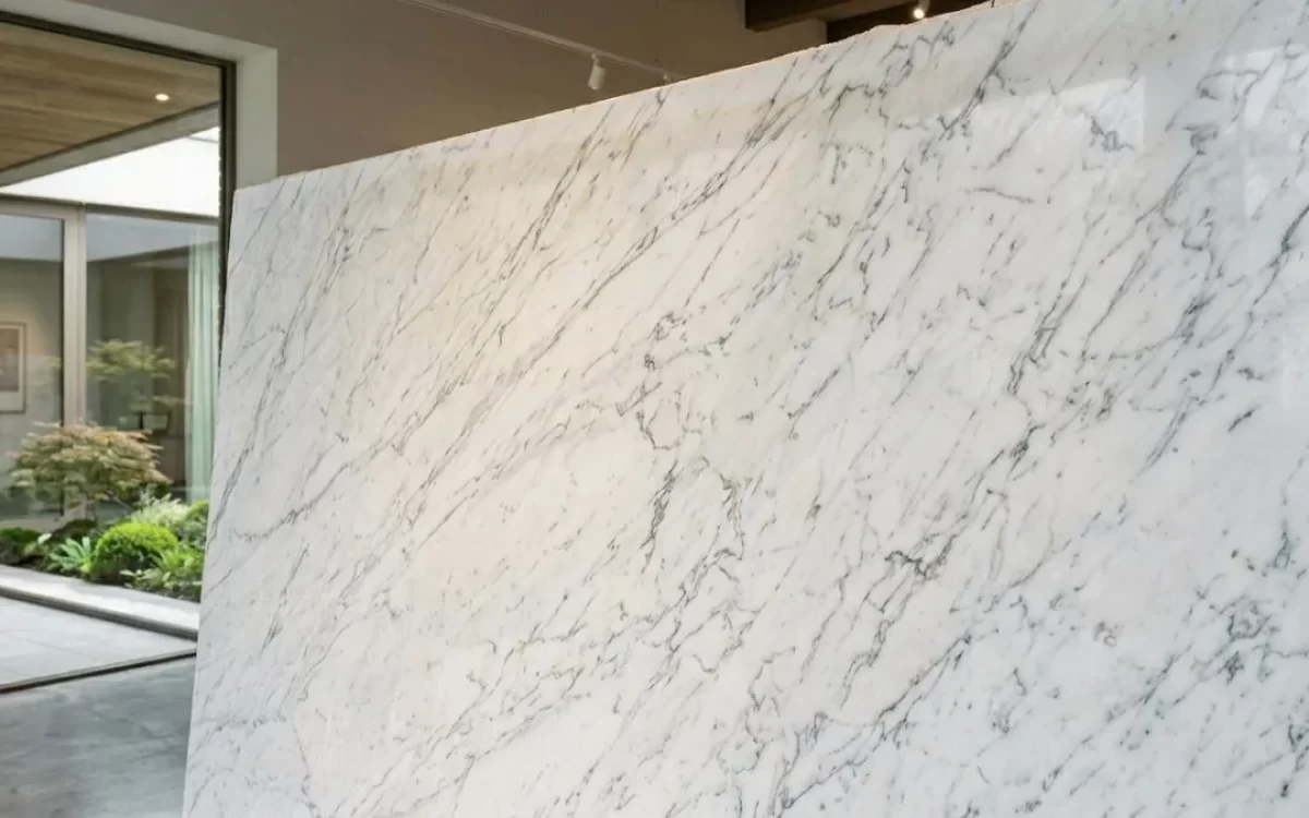A close-up shot of a standing slab of Italian Marble. That shows the detailed grey patterns and smooth texture that make this Marble a popular choice for home luxury.